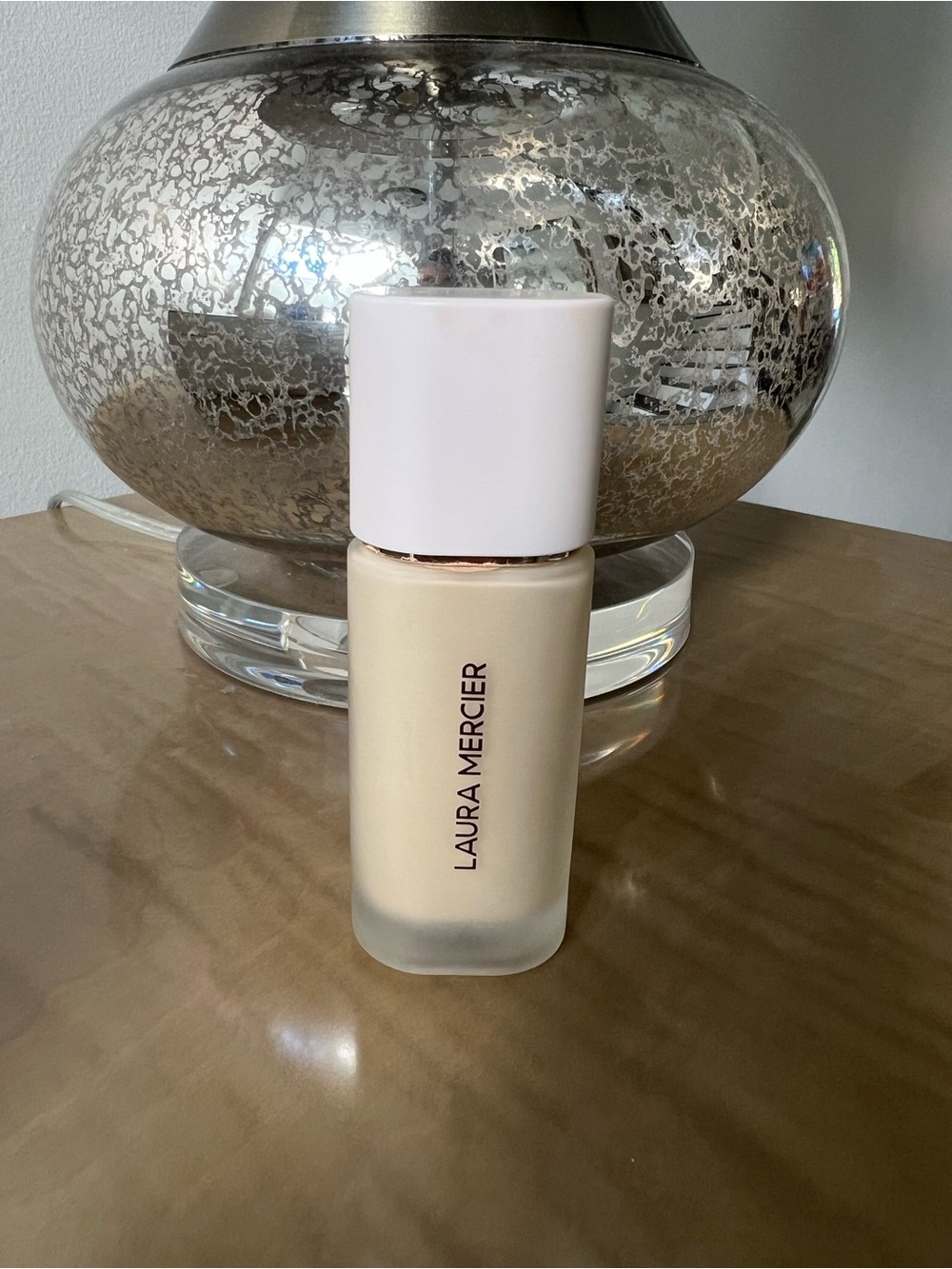 laura mercier Lightweight Foundation - Cream Shade. 0W1 Satin